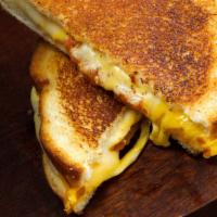 Griddled Cheese · American, swiss, Monterey jack and cheddar cheeses, tomato.