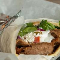 Beef & Lamb Gyro Wraps · Seasoned beef and lamb mix cooked on a vertical rotisserie, served with tzatziki sauce, feta...