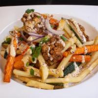 Fried Veggie Specialty Items · Vegan. Carrot, zucchini, cauliflower, potato deep fried, and tossed with tahini sauce.