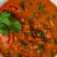 Foul · Slow-cooked fava beans mixed with tomatoes, onions, and spices and then pureed.