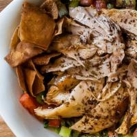 Chicken Salad · Shredded roasted chicken mixed with yemeni-style salad.