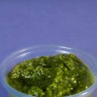 Extra Green Chutney · Caution - our signature green chutney could change your life. Made from cilantro, onions, ga...