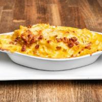 Mac N Cheese With Andouille Sausage · Not your mom's mac n cheese.  Baked mac n cheese with andouille sausage to add a spicy bite.