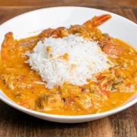 Gumbo · New Orleans styled stew with vegetables, shrimp, crabmeat, and andouille sausage on a bed or...