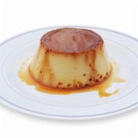 Flan · A soft custard baked in a caramelized syrup.
