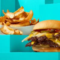 Classic Smashburger Combo · Double cheeseburger, freshly smashed, seared, and topped with American cheese, pickles, gril...