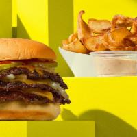 Triple Smashburger Combo · Triple cheeseburger, freshly smashed, seared, and topped with American cheese, pickles, gril...