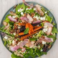 Roasted Carrot Salad · Gluten free. Mixed greens & spinach, quinoa, roasted carrots & red onions, feta, toasted pec...