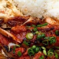 Korean Chicken · Grilled Boneless Thighs with Spicy Sweet Korean Sauce and Won Bok Kimchi. Served with Steame...