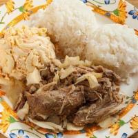 Kalua Pig & Cabbage · Pork Shoulder Slow Roasted in Banana Leaves with Steamed Cabbage. Comes with Rice and Choice...