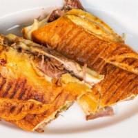 Cuban Sandwich · Pernil, queso, jamon, pepinillos, mayonaise.