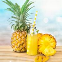 Pineapple Juice · Fresh tropical juice made from delicious, sweet pineapples.