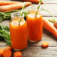 Carrot Juice · Fresh and healthy juice made from carrots.