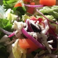 Greek Salad · Fresh mixed greens topped with tomatoes, mediterranean olives, onions, and feta cheese tosse...