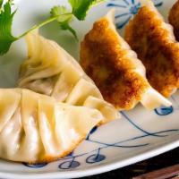 Fried Dumplings / 锅贴 · eight pieces.of large one.