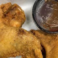 Chicken Wings - Kid'S · 2 fried chicken wings Comes with your choice of one side. Regular size sides are included, l...