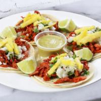 Tacos · SOFT PALM SIZE CORN TORTILLAS FILLED WITH YOUR CHOICE OF MEAT PREPARED WITH CILANTRO, ONION ...