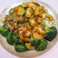 Triple Delight · Chicken, shrimp, and beef with mixed vegetables in chefs special sauce.