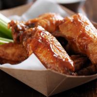 Regular Buffalo Wings · Deep fried chicken wings tossed in our regular
Buffalo sauce. Comes with your choice of dip ...