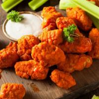 Mild Buffalo Wings · Deep fried chicken wings tossed in our mild Buffalo
sauce. Comes with your choice of dip and...