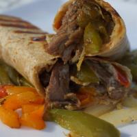 Philly Cheesesteak Wrap · Flank steak, peppers, onions, cheese.