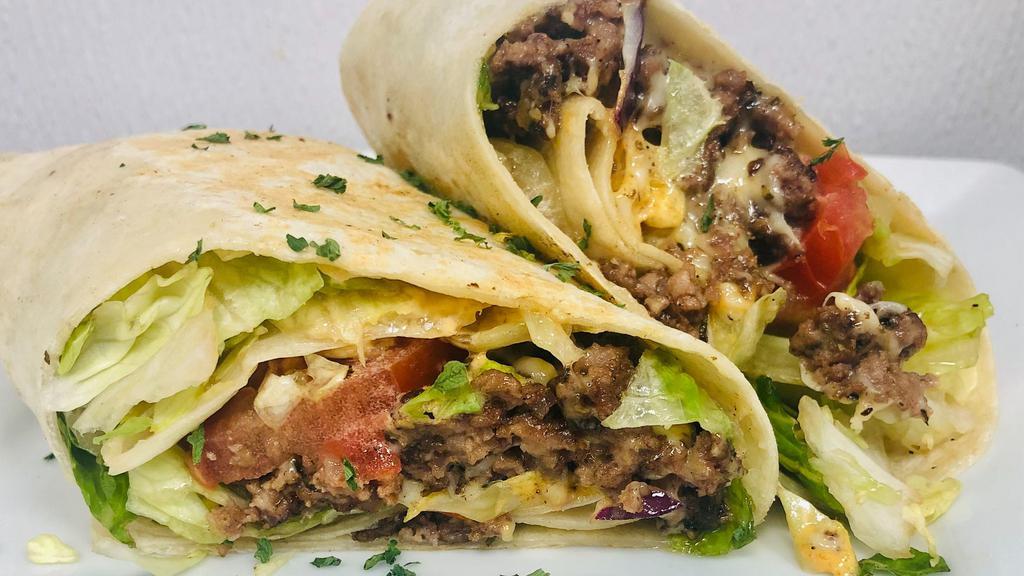 Chop Cheese Wrap · Seasoned Ground Beef, Lettuce, Tomatoes, Cheese, on your choice of wrap