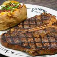 Porterhouse · 22 oz. Served with a side & your choice of dinner Caesar salad, dinner salad (with a choice ...