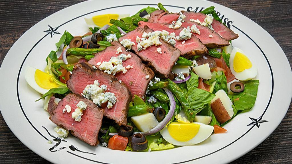 Steak Salad · Center-cut top sirloin, crisp Romaine, red potatoes, eggs, green beans, black olives, onions, tomatoes, bleu cheese, balsamic vinaigrette.