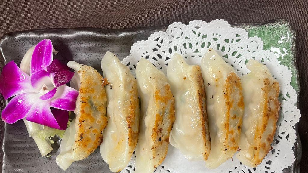Shrimp Gyoza · Six pieces. Pan fried or steamed Japanese dumplings.
