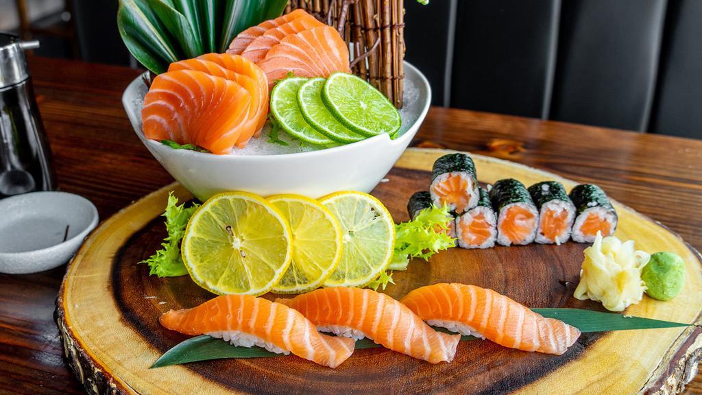 Salmon Lover · Three pieces of salmon sushi, six pieces salmon sashimi and salmon roll.