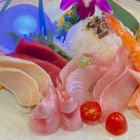Chirashi · Salmon, tuna, white fish, kani, egg on top of rice bowl.