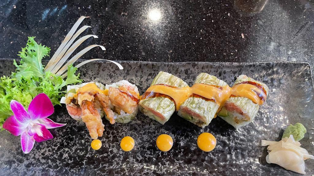 Tiger Roll · Soft-shelled crab, spicy tuna, cucumber, and avocado with marble kombu wrap, eel sauce.
