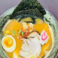 Charsiu Ramen Noodle Soup · Signature pork broth, miso, charsiu, scallion, soft boiled egg, wavy noodle.