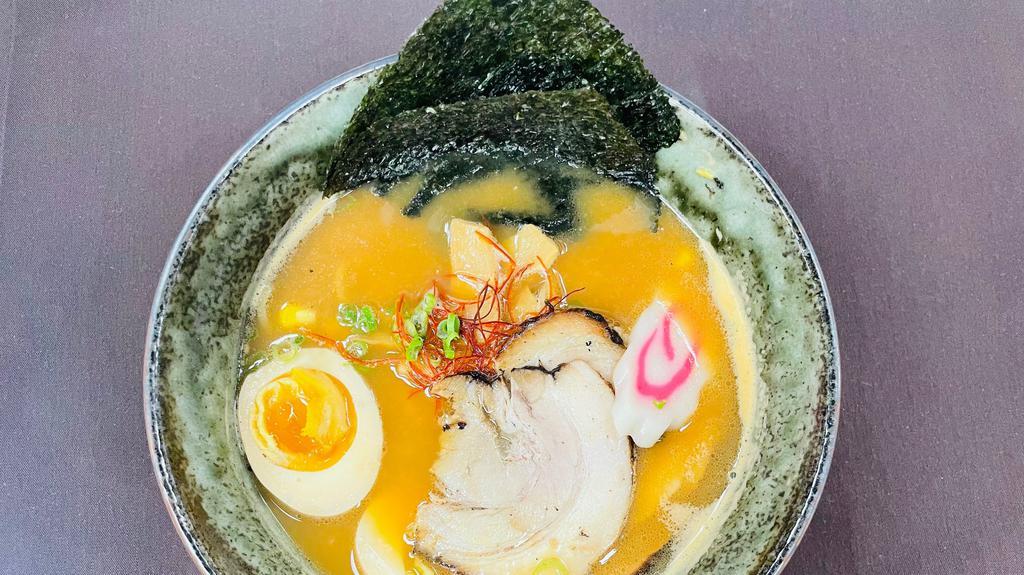 Charsiu Ramen Noodle Soup · Signature pork broth, miso, charsiu, scallion, soft boiled egg, wavy noodle.