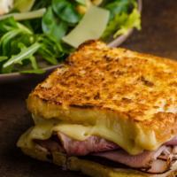 French Toast Sandwich  · Your choice of meat, one egg, and your choice of cheese on two jumbo fluffy french toast mel...