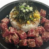Flat Iron Steak · Tender bite-sized steak, served with buttery corn, and topped with nori and toasted sesame s...