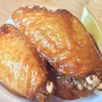 Honey Glazed Wings · Fried chicken wings drizzled in lemon honey glazed dressings.