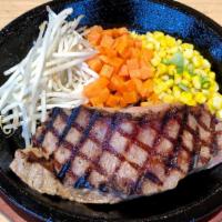 New York Steak · 8oz. NY Steak.  Served with rice, bean sprout, carrots, buttery corn, and topped with scalli...