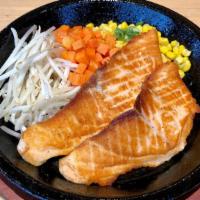 Grilled Salmon · Two pieces of Atlantic Salmon fillets.   Served with rice, bean sprouts, carrots, buttery co...