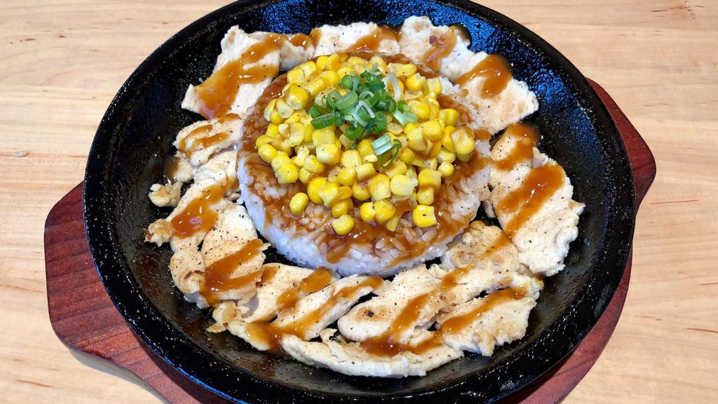 Just Chicken · All natural chicken white meat.  Served with rice, buttery corn, and topped with scallion.