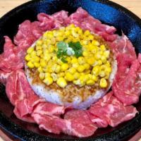 Sirloin Steak · Sliced Sirloin steak.   Served with rice, buttery corn, and topped with scallion.