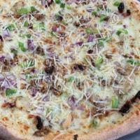Garlic Chicken Pizza  · Creamy garlic sauce topped with grilled chicken, sun-dried tomatoes, green peppers, red onio...