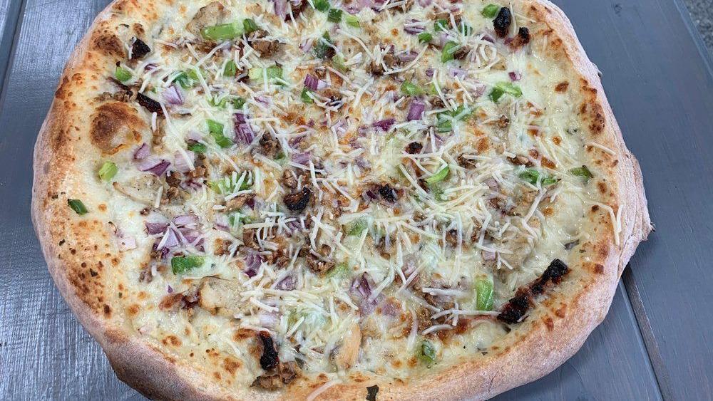 Garlic Chicken Pizza  · Creamy garlic sauce topped with grilled chicken, sun-dried tomatoes, green peppers, red onions, roasted garlic and grated Parmesan cheese.