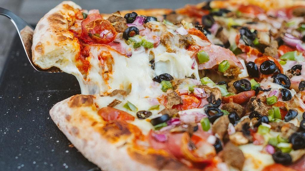 Veggie Pizza  · The champs method of getting veggies. Green peppers, mushrooms, tomatoes, red onions, and black olives all atop our classic red pizza sauce.