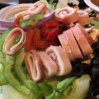 Antipasto Salad · Lettuce, red onion, tomato, olives, bell peppers, mushrooms, ham, salami, cheese and roasted...