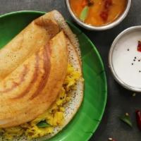 Masala Dosa · Crepe made with Lentil and rice flour batter, Served with chutnies and sambar.