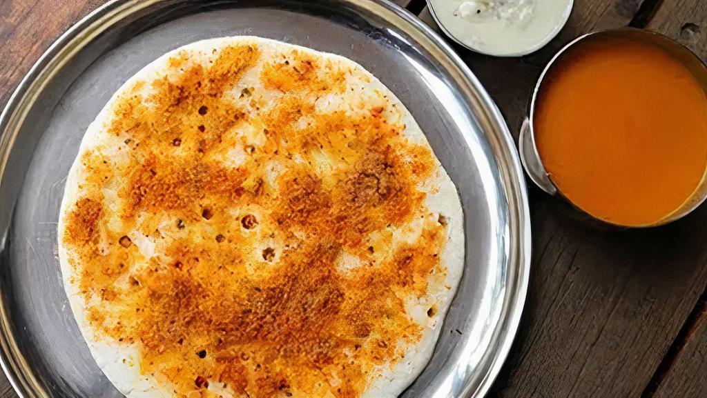 Podi Dosa · Crepe made with Lentil and rice flour batter, Served with chutnies and sambar.