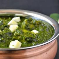 Palak Paneer (Spinach) · Spinach and cheese cooked with onions.