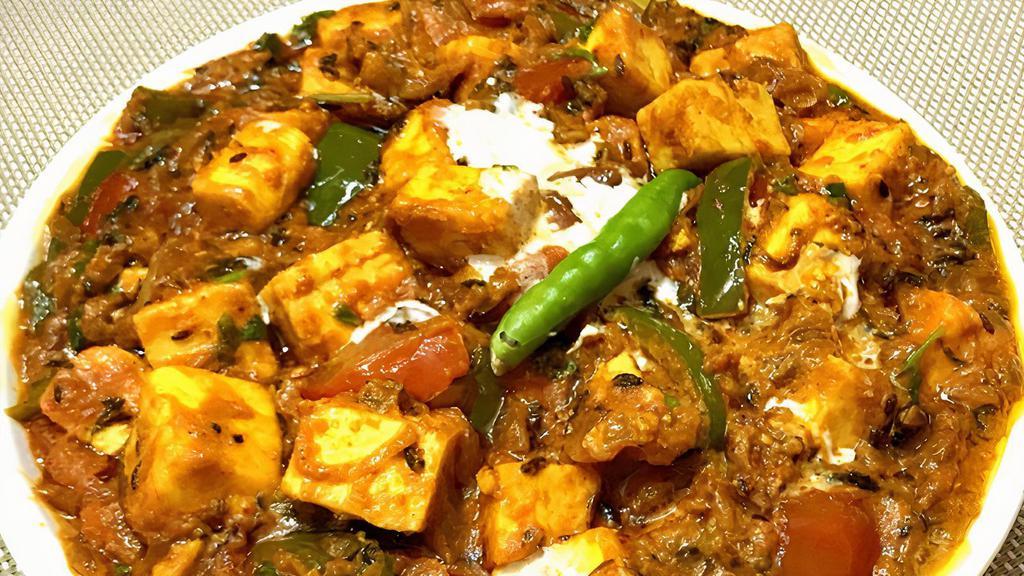 Paneer Chatpata · Vegetable and cheese cooked with onion and tomatoes and almond sauce