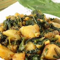 Aloo Palak · Spinach and potatoes cooked with onion.